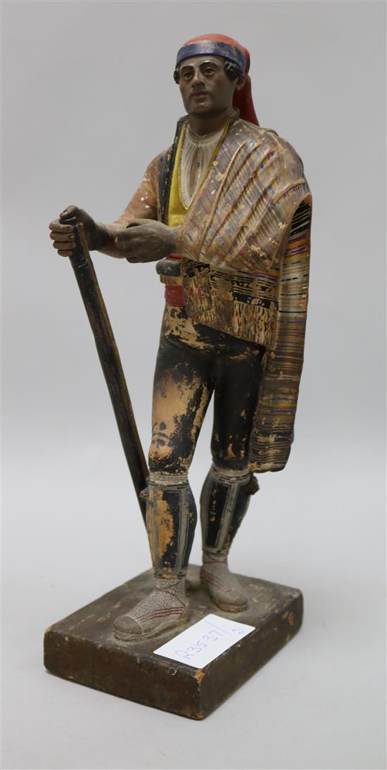 A French terracotta painted male figure